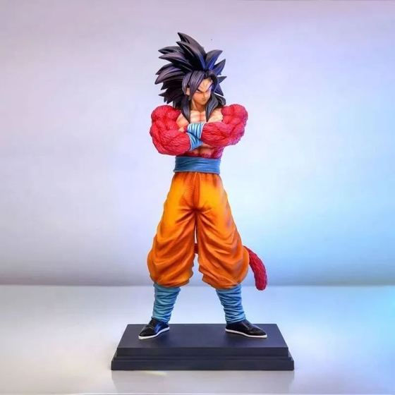 Goku Super Saiyan 4 figure with red fur, black hair, tail and crossed arms on a black base