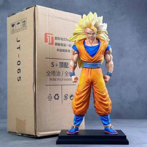 Goku Super Saiyan 3 figure with long golden hair, orange gi and clenched fists on a black base